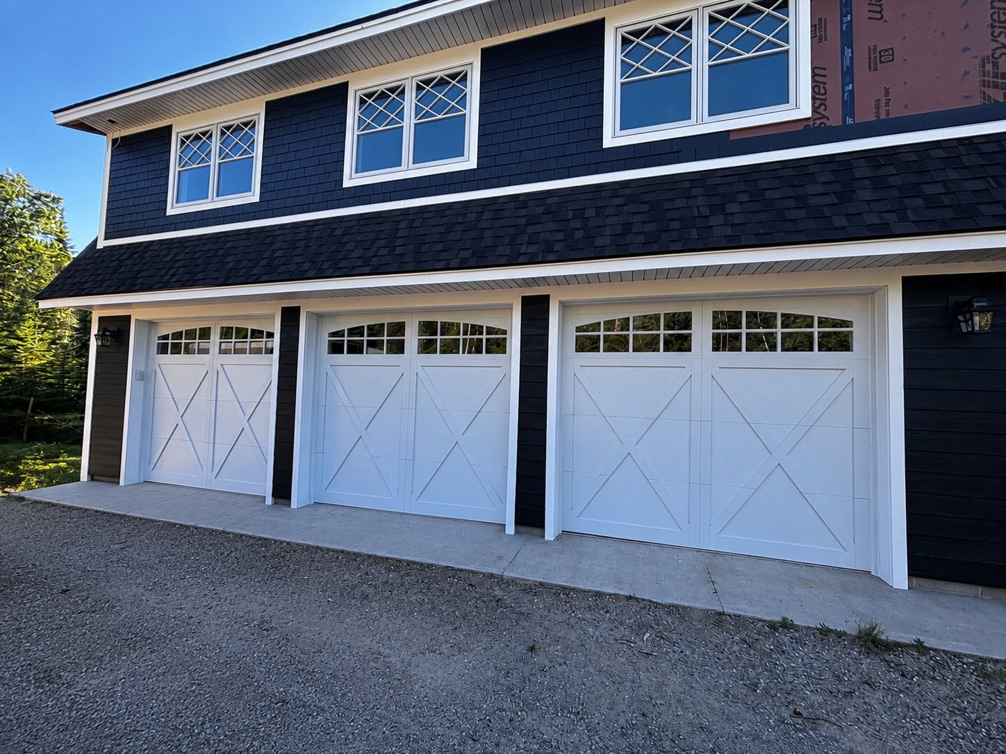 Residential garage door project completed by Precise Door Co.